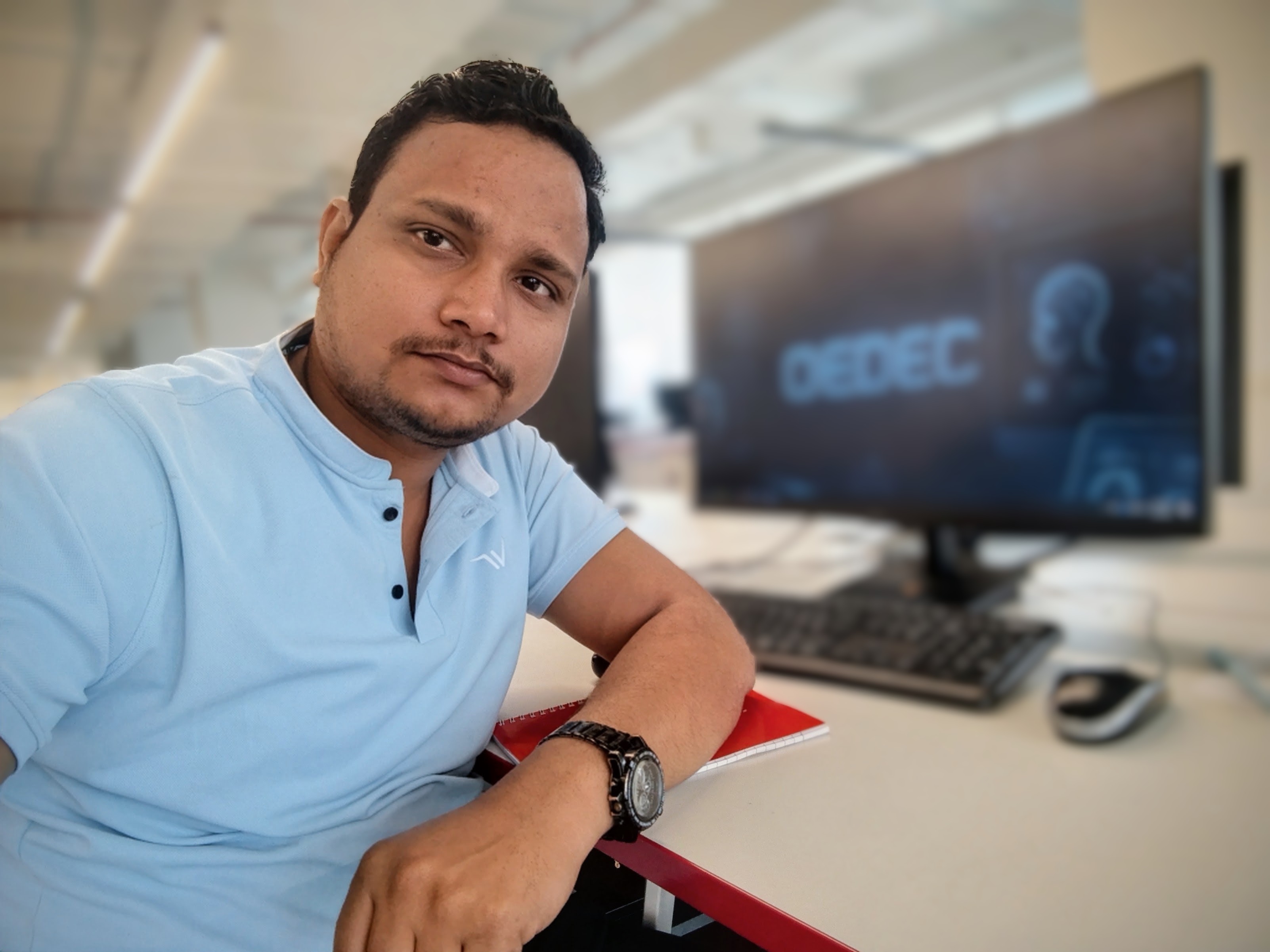 Pawan Kumar at his workspace
